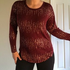 Red and gold sweater